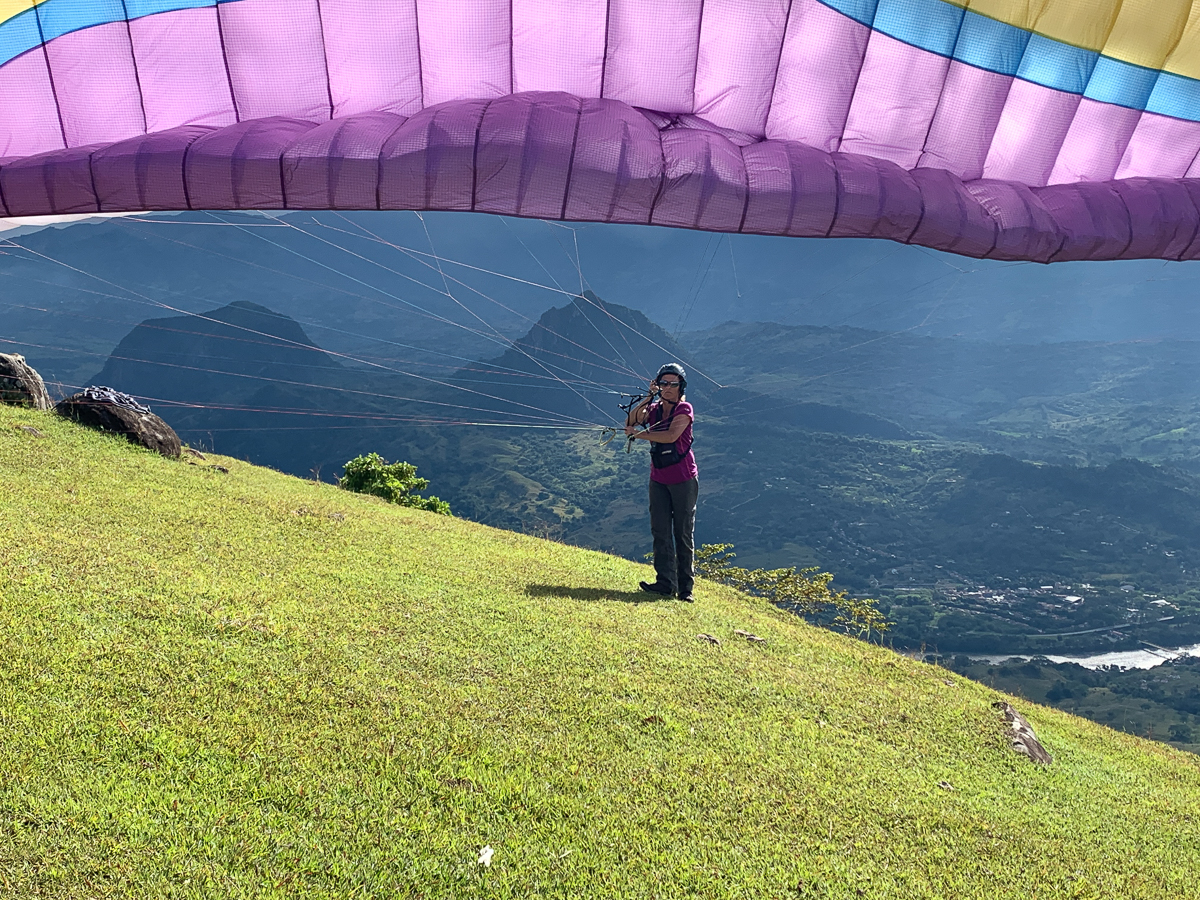 Paraglider with Mountains in the background.