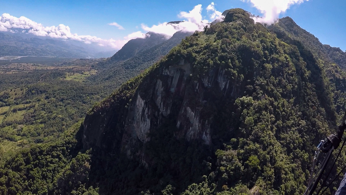 Massive cliff viewed from a paraglider in the Cauca Valley