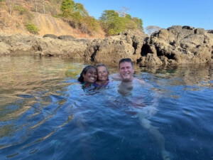 Maren with the owners of Jerah Thai in Jaco. Best Thai food we know, and some of the nicest people too! Swimming in a 'secret' tide pool that only a few know about.