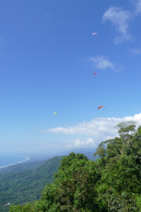 Discover Paragliding Tour one, high in the sky over the Dominical launch.