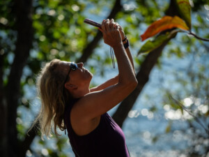 Maren, looking up and taking a pic of the many Macaws above.