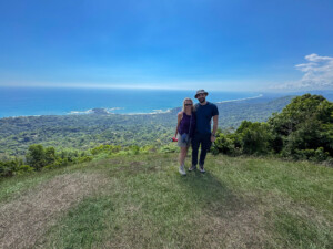 Maren and Andrea at the Domincal launch, the beach and the Pacific ocean in the distance.