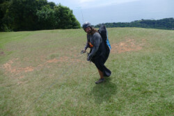 Mischievous. Pilot at the Las Escaleras launch above Dominical, Cost a Rica.
